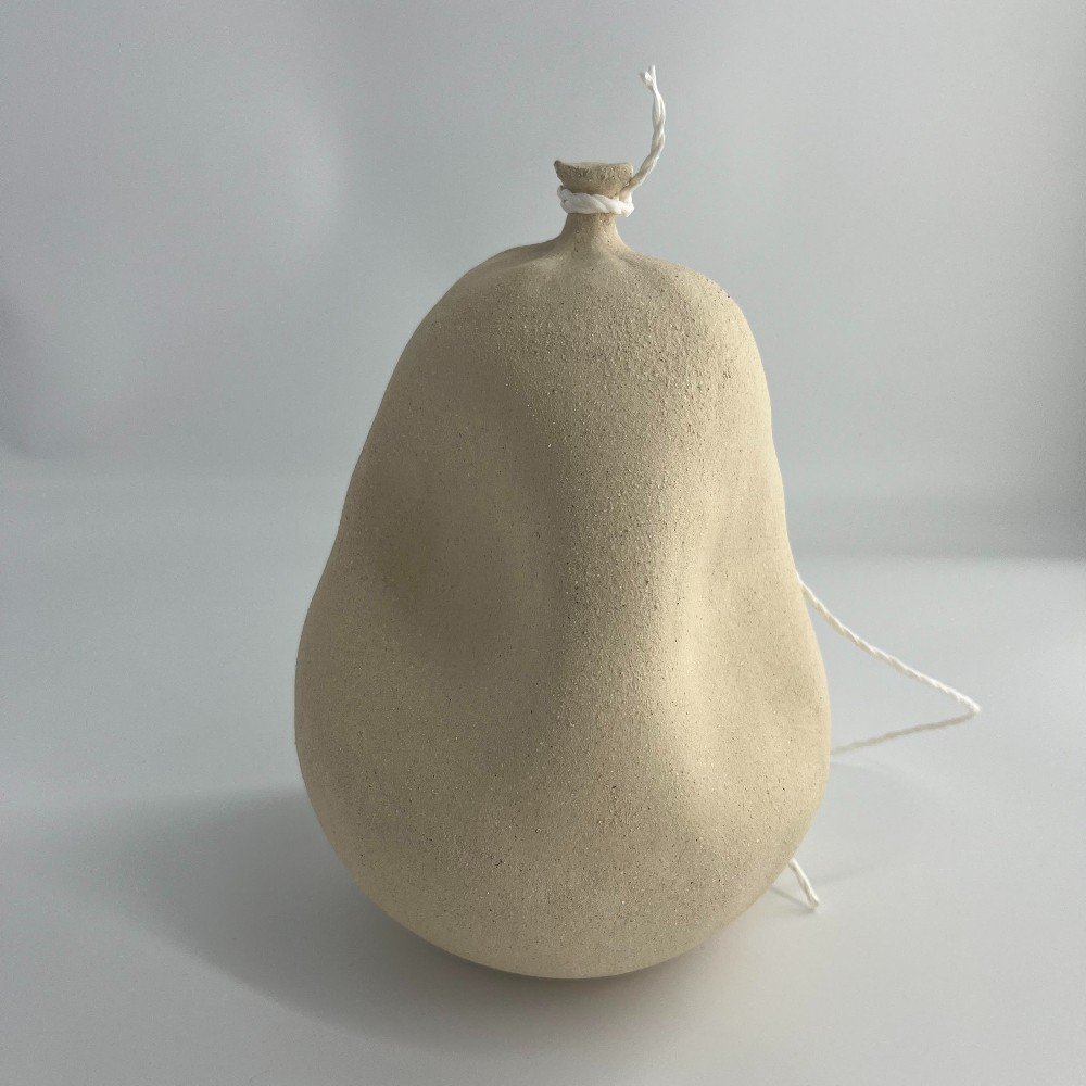 Beige Raw Clay Deflated Ceramic Balloon with Two Dents