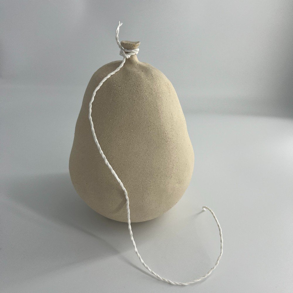 Beige Raw Clay Deflated Ceramic Balloon with Two Dents