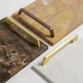Carrara marble board 
with wooden handles