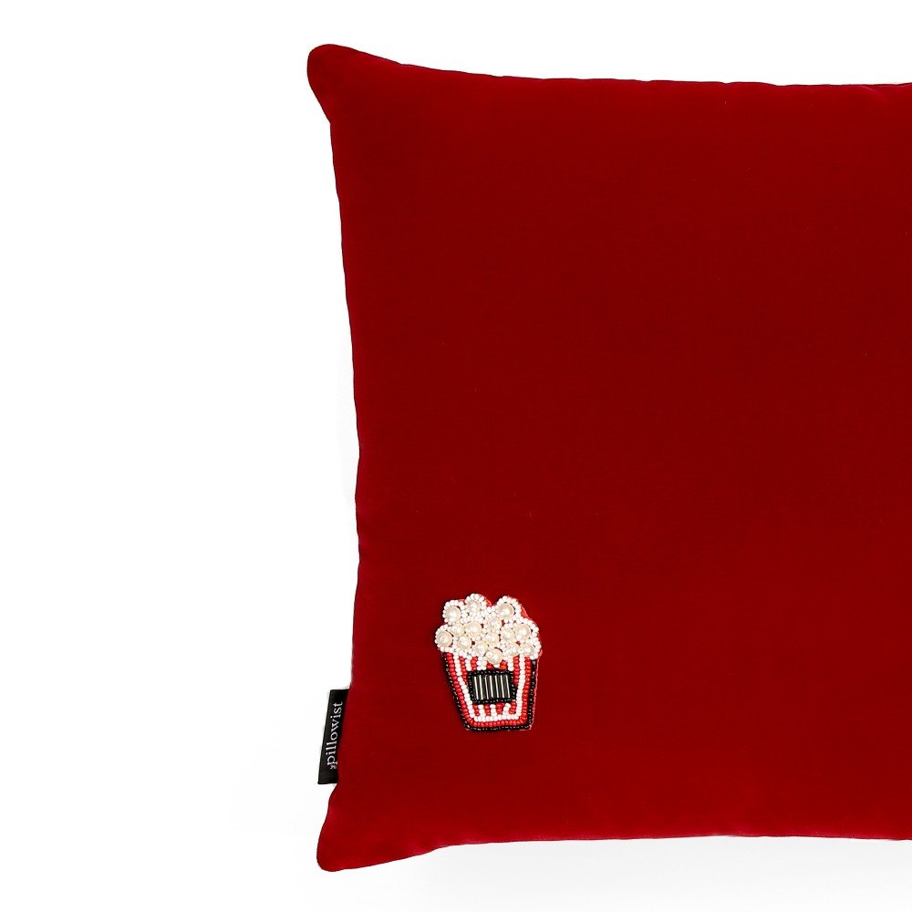 Embroidered red velvet popcorn cushion