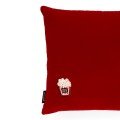 Embroidered red velvet popcorn cushion