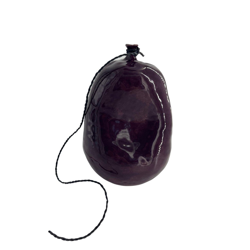 Purple Deflated Ceramic Balloon with One Dent