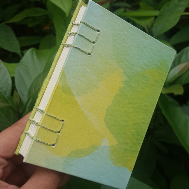 Small journal: light 
green abstract design