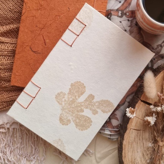 Journal: brown leaf 
printed pattern