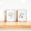 Two Porcelain Ashtrays: 
Faces Design I