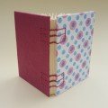 Small journal: magenta 
evil eye pattern