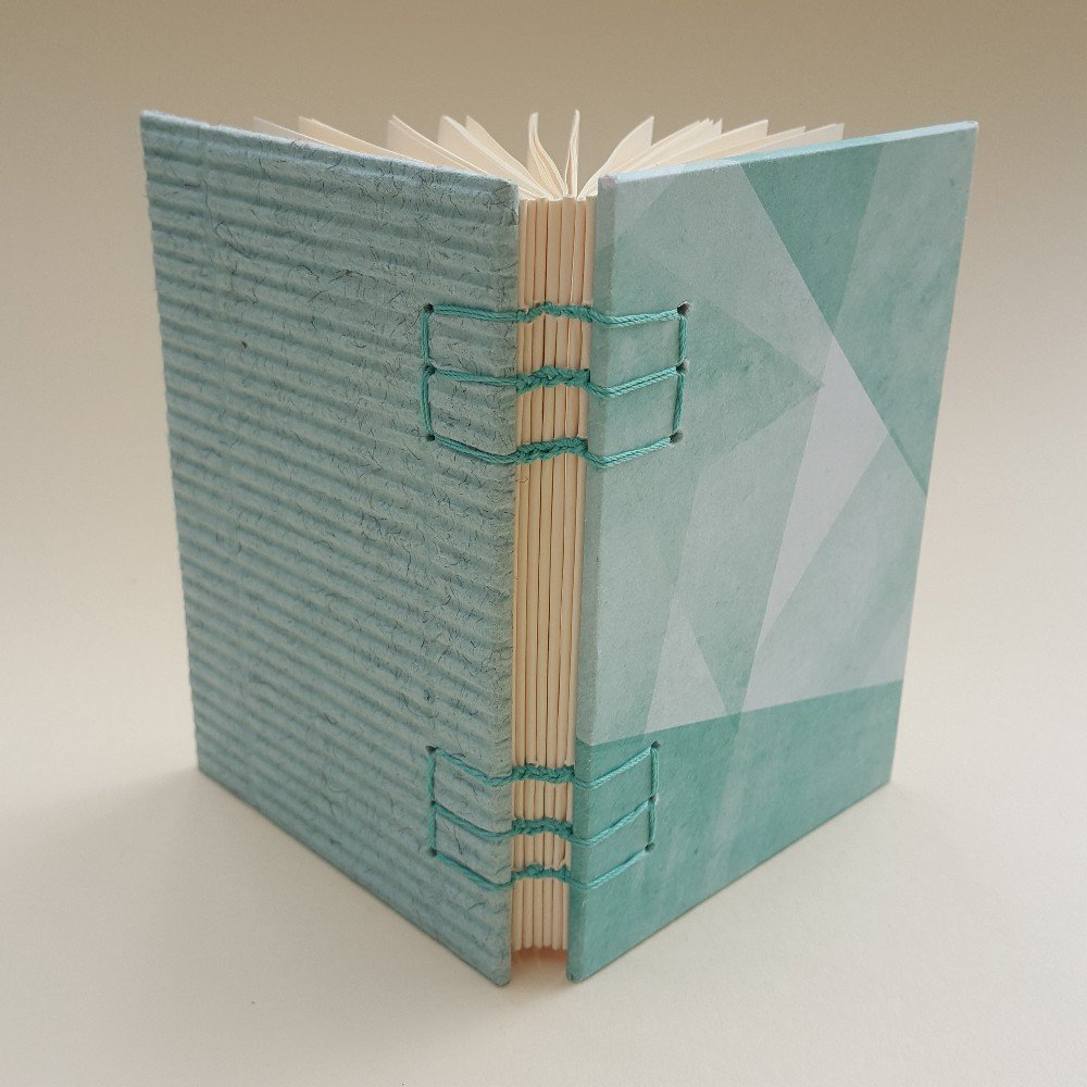 Small journal: cyan 
abstract design