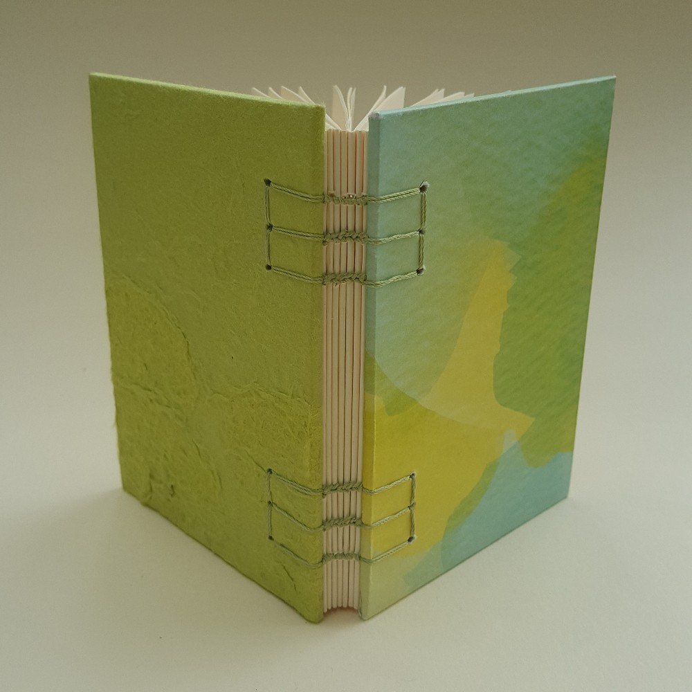 Small journal: light 
green abstract design
