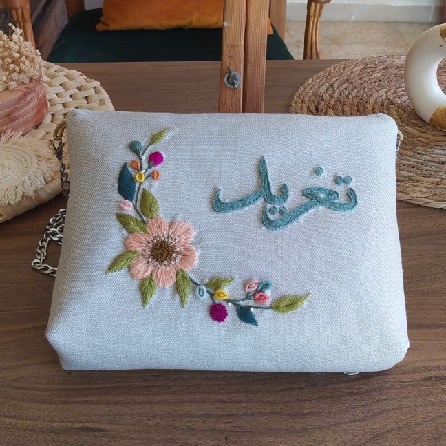 Customizable Embroidered 
Floral Clutch