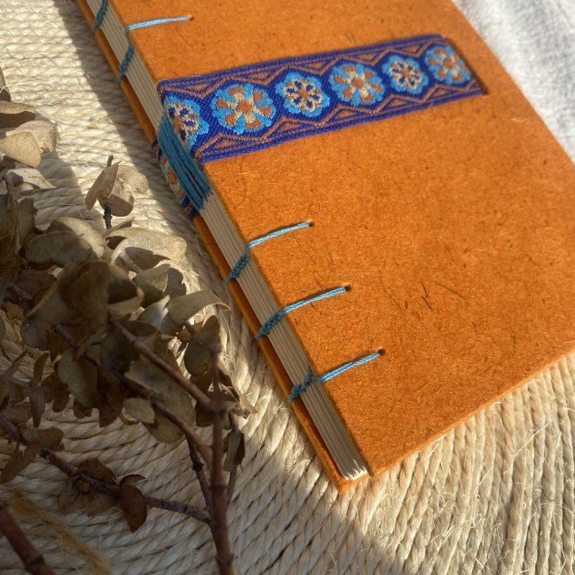 Journal: orange with blue embroidered ribbon