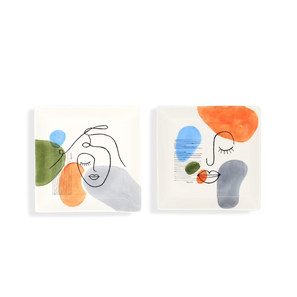 Two Porcelain Ashtrays: 
Abstract Faces Design