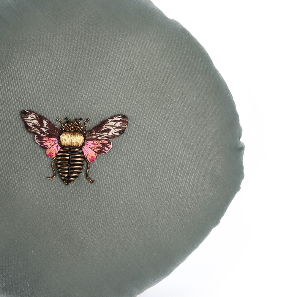 Embroidered sage velvet moth cushion